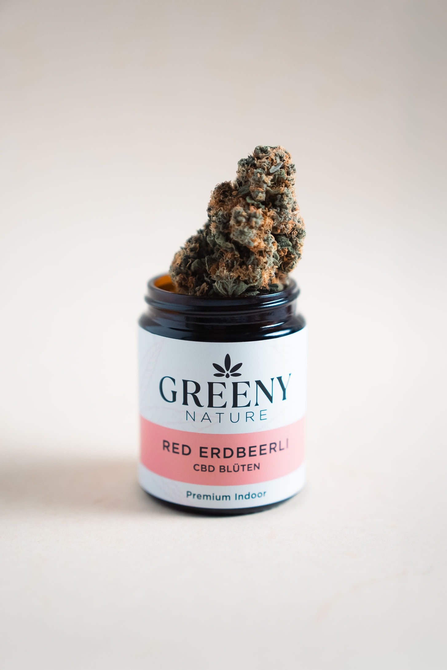 Auf der Produktseite von Red Erdbeerli: 5G Greeny Nature Glas mit Blüte – erfahre, warum diese Sorte einzigartig ist